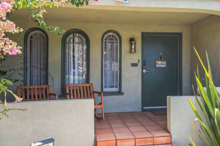 Relax on the charming porch after a smooth, hassle-free check-in process—your perfect getaway starts here. Relax on the charming porch after a smooth, hassle-free check-in process—your perfect getaway starts here.